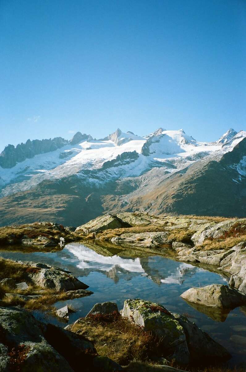 The vast Aletsch Glacier curving between Alpine peaks