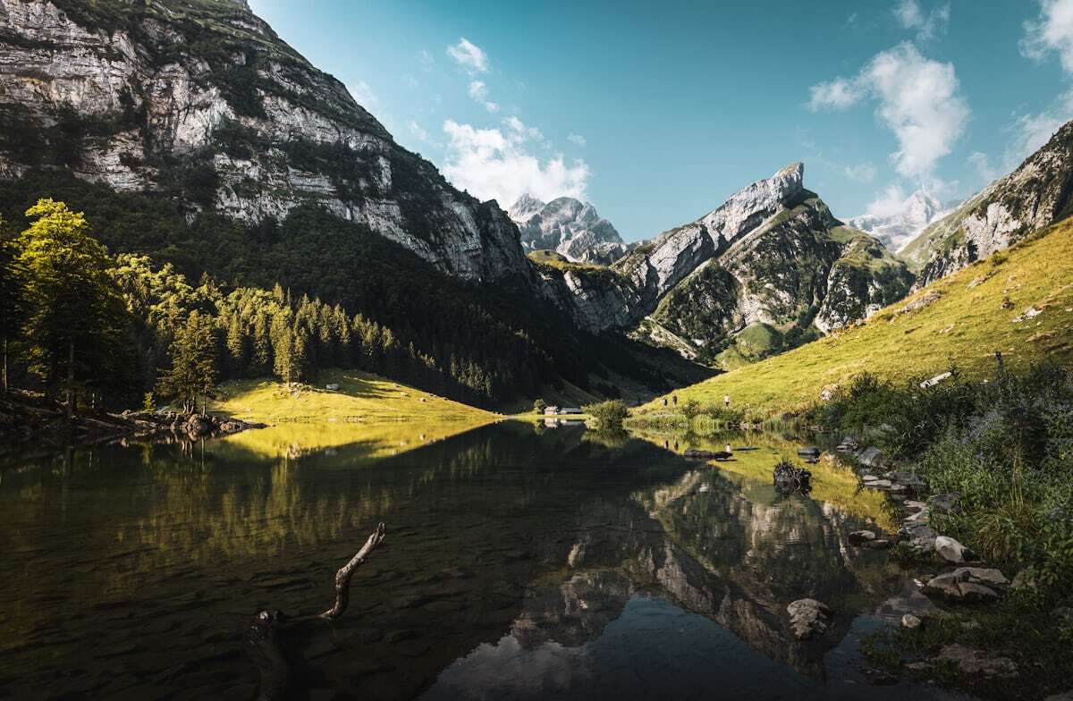 Seealpsee lake beneath the Säntis massif in Appenzell