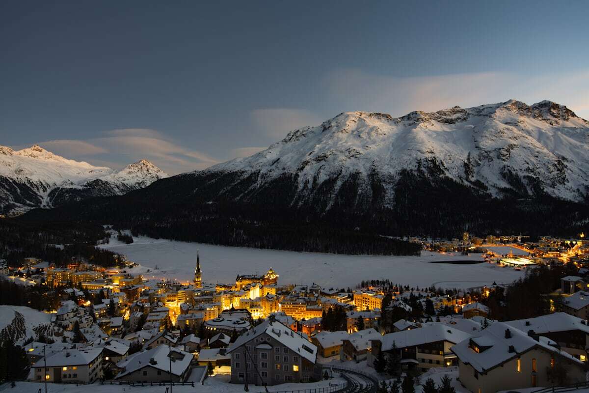 St. Moritz resort reflected in its Engadin lake