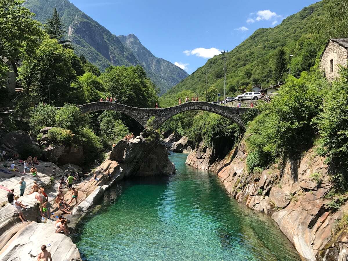 The arched Ponte dei Salti over the turquoise Verzasca river